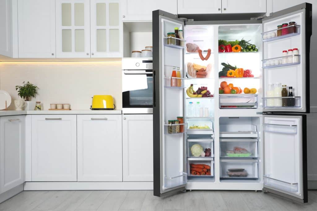 Open refrigerator filled with food